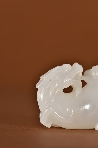 和田玉籽料|和田玉籽料麒麟送书把件