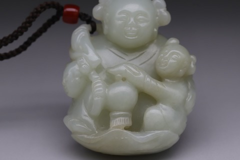 |回流 舊藏和田玉“枣红皮 执穗童子”