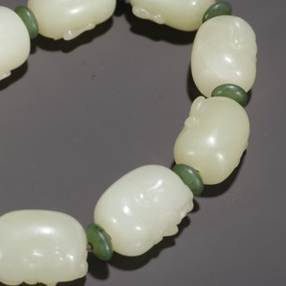 铜币|和田玉罗汉手串