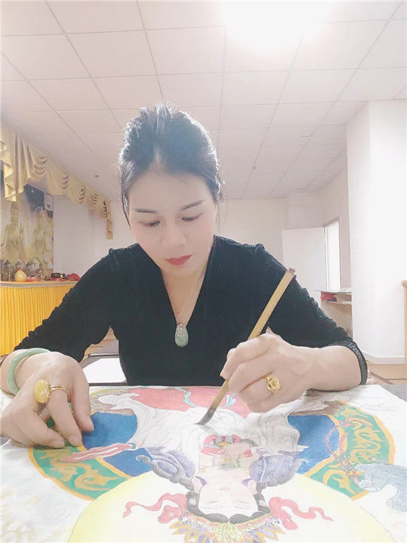 |中医沉香药酒手火疗法传承人——周月兰