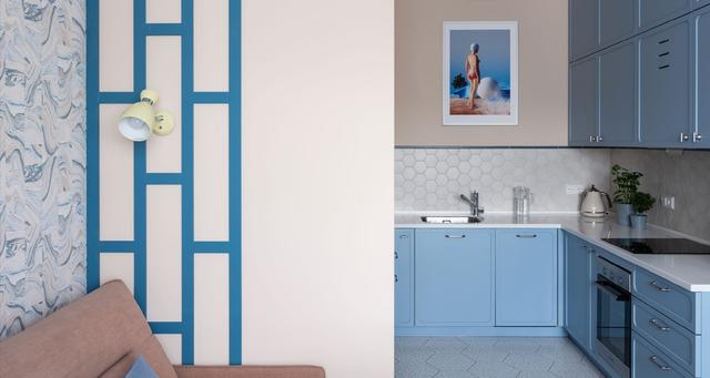 简洁明快蓝色调,与暖暖的色彩配合,让小公寓装饰事半功倍