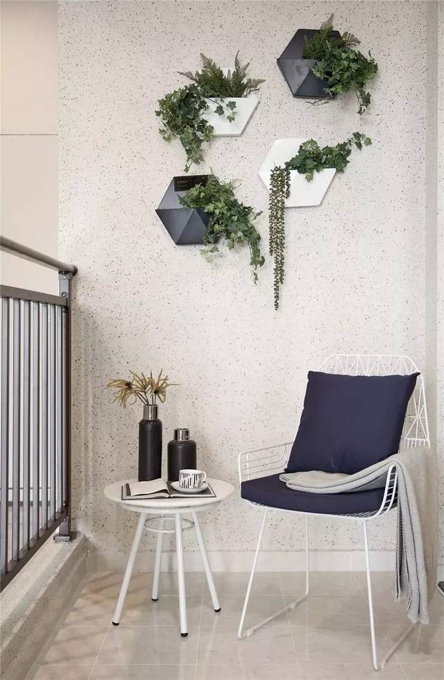 89平现代风三居室,沙发背景墙和餐厅连在一起,简洁而又大方