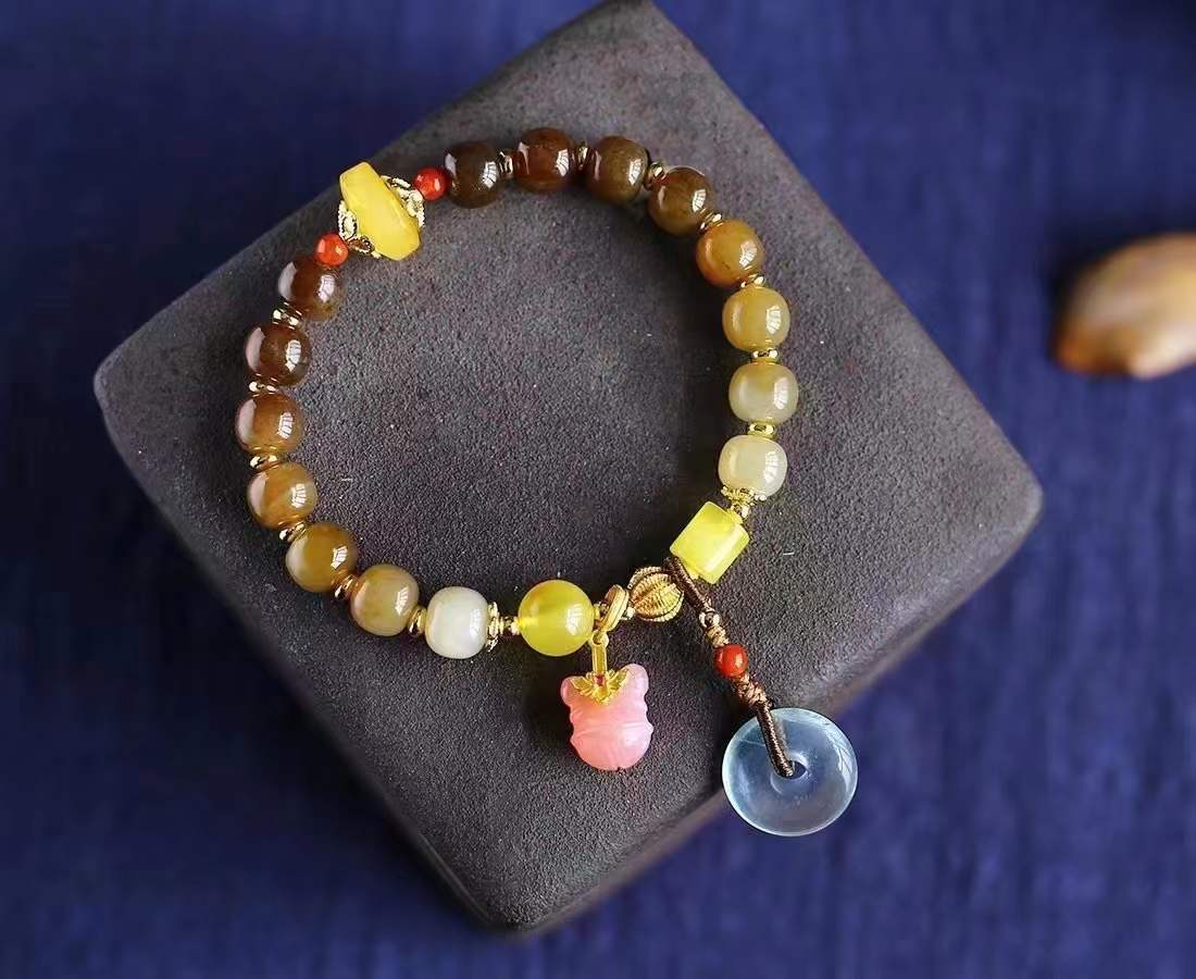 |天然和田玉渐变色糖料老形珠