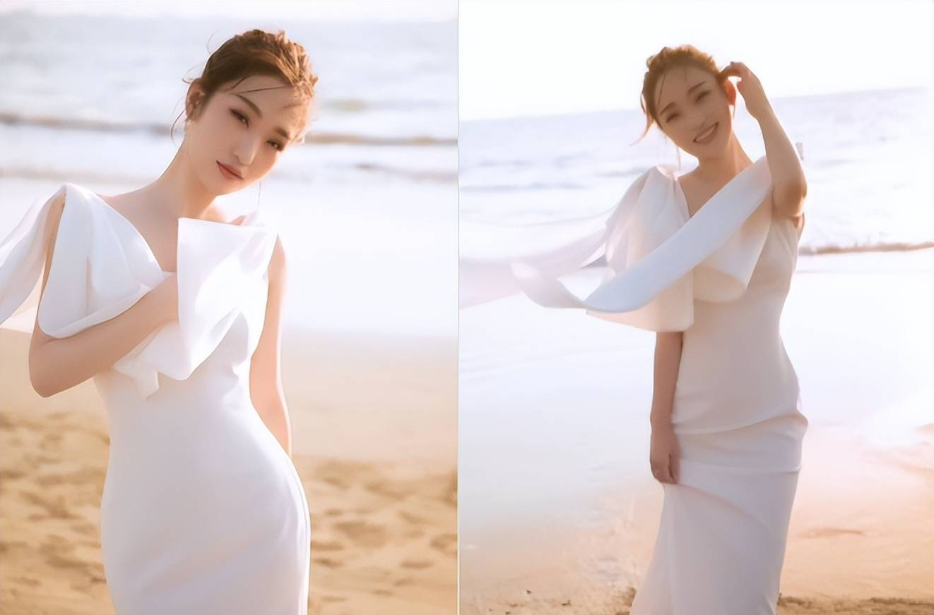 央视|央视蓝羽海边拍性感大片！扭腰抬手好妩媚