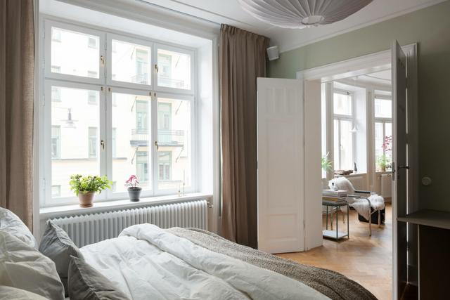 地板好看成功一半,67平原木+浅绿北欧风住宅,橡木地板气质出众