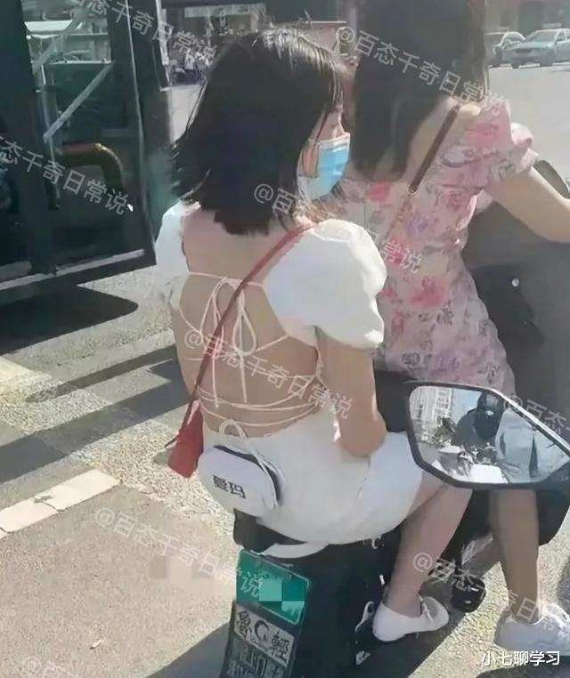 江苏:女子骑车带闺蜜,闺蜜清凉装扮很惹眼,男子跟了好几条街