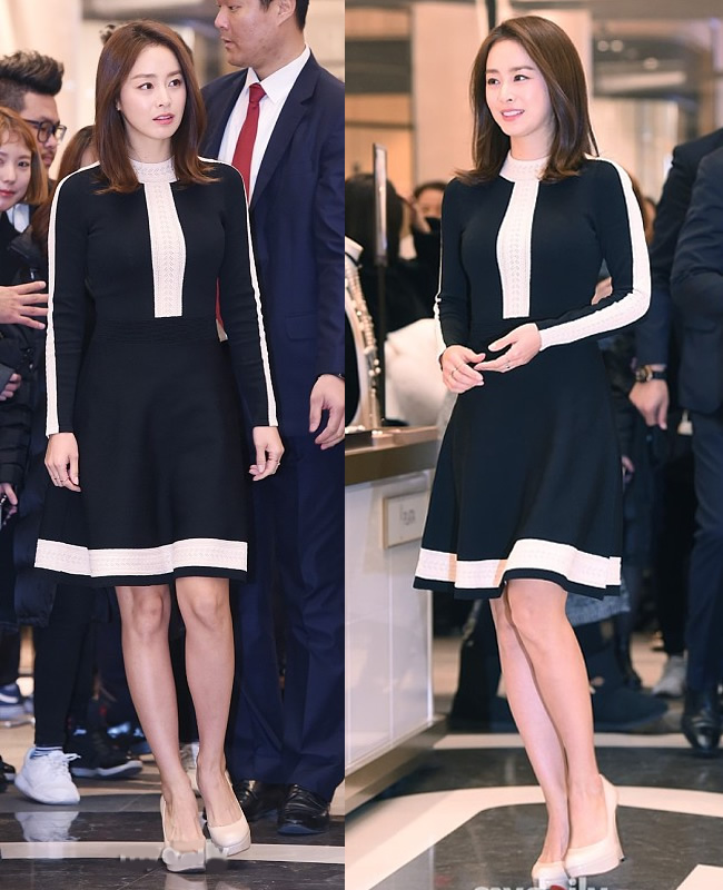 金泰熙拍新剧,丸子头配桔色大衣搭白毛衣优雅时尚很美丽,真年轻