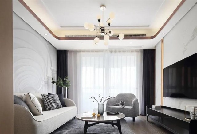 88平现代风二居室,沙发背景整个墙面是圆弧形的图案很特别