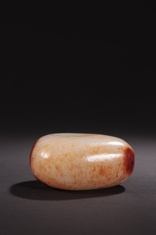 |清代-和田玉带红皮原石。