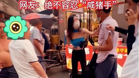 广东：“你敢摸我”，疑似被男子骚扰，女子抓住男子不放手