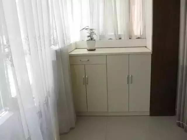 阳台打一个柜子,多出好几平,相当于帮我们赚了几万块