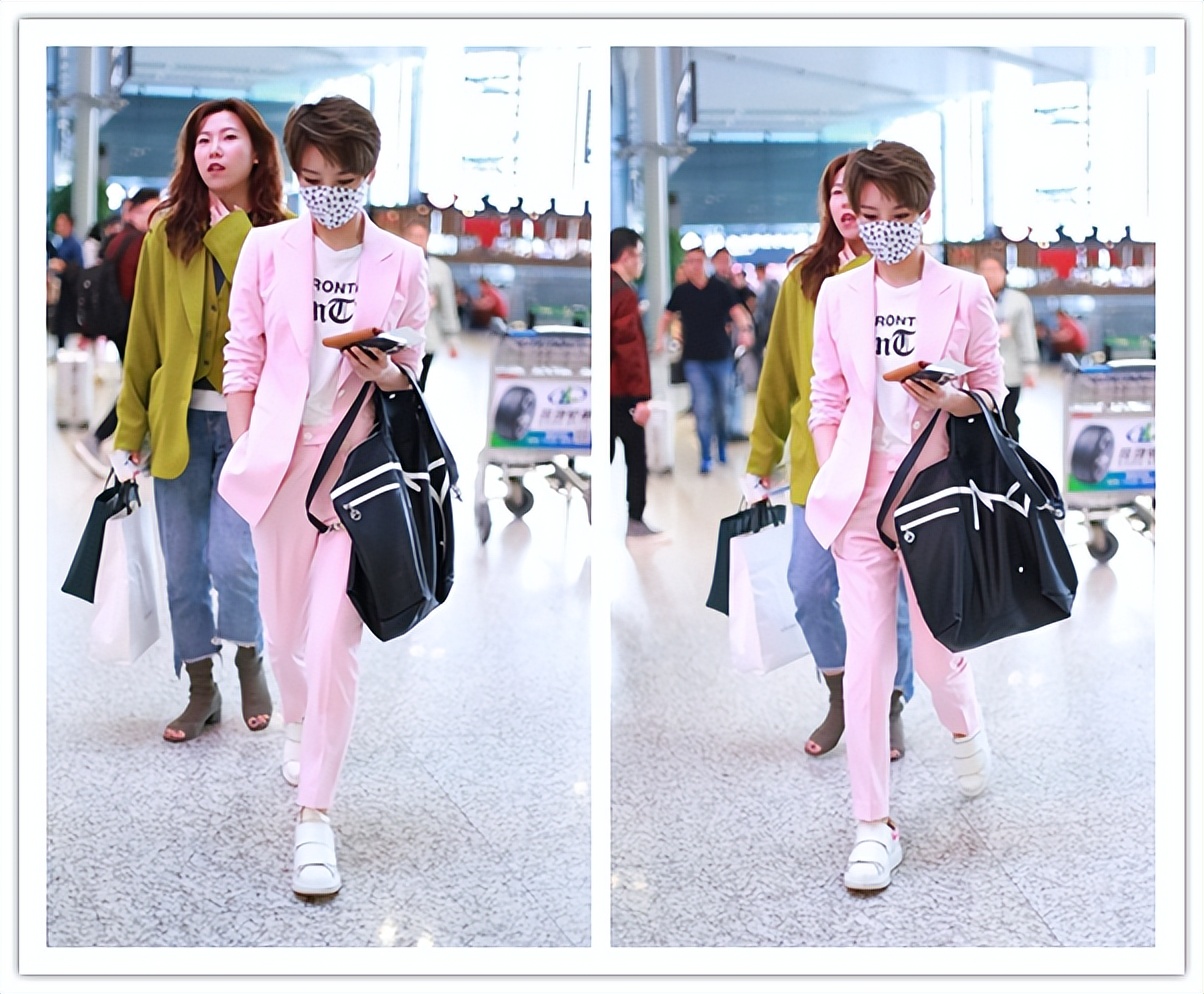 西装 吴京的老婆越看越好看,有满满的温柔感,短发西服也不显老