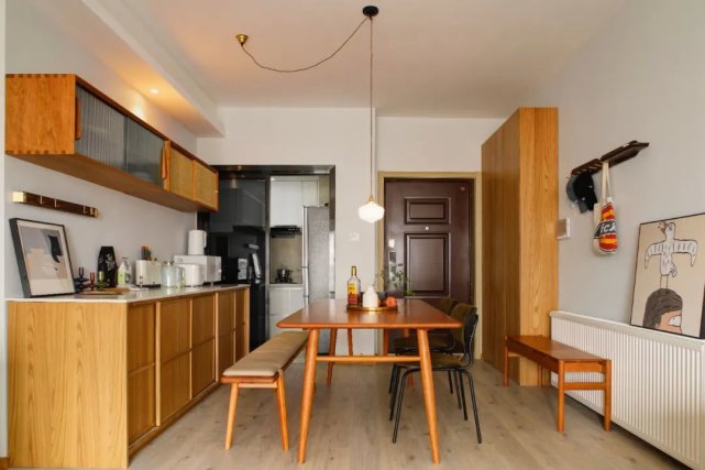 99㎡极简三室改两室装修设计,浅绿色的卧室很清新