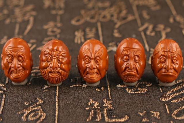 橄榄核|花1000块钱买的橄榄核,是机雕还是手雕?