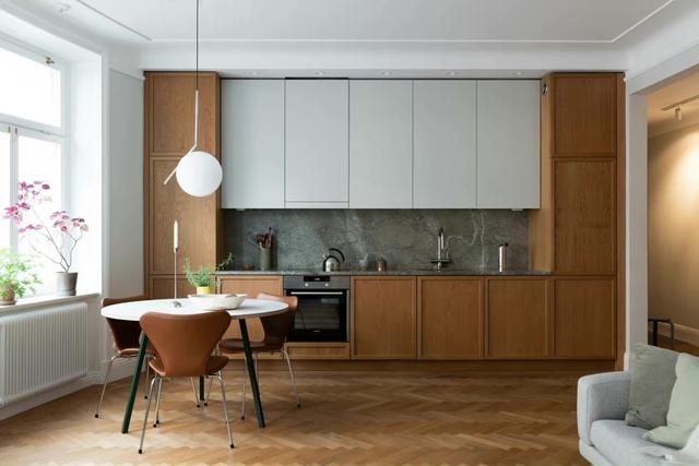 地板好看成功一半,67平原木+浅绿北欧风住宅,橡木地板气质出众