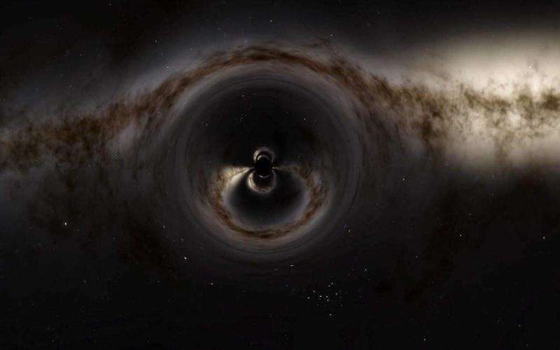 黑洞合并产生巨大后座力 把自己踢出宿主星系