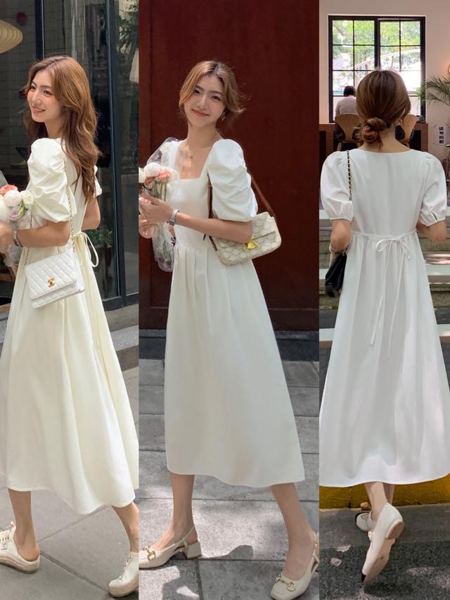 夏季选择“连衣裙”，长度最好超过膝盖，看起来更有气质