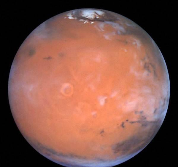 地球上一个70公斤的人,到了火星上还剩多少重量?