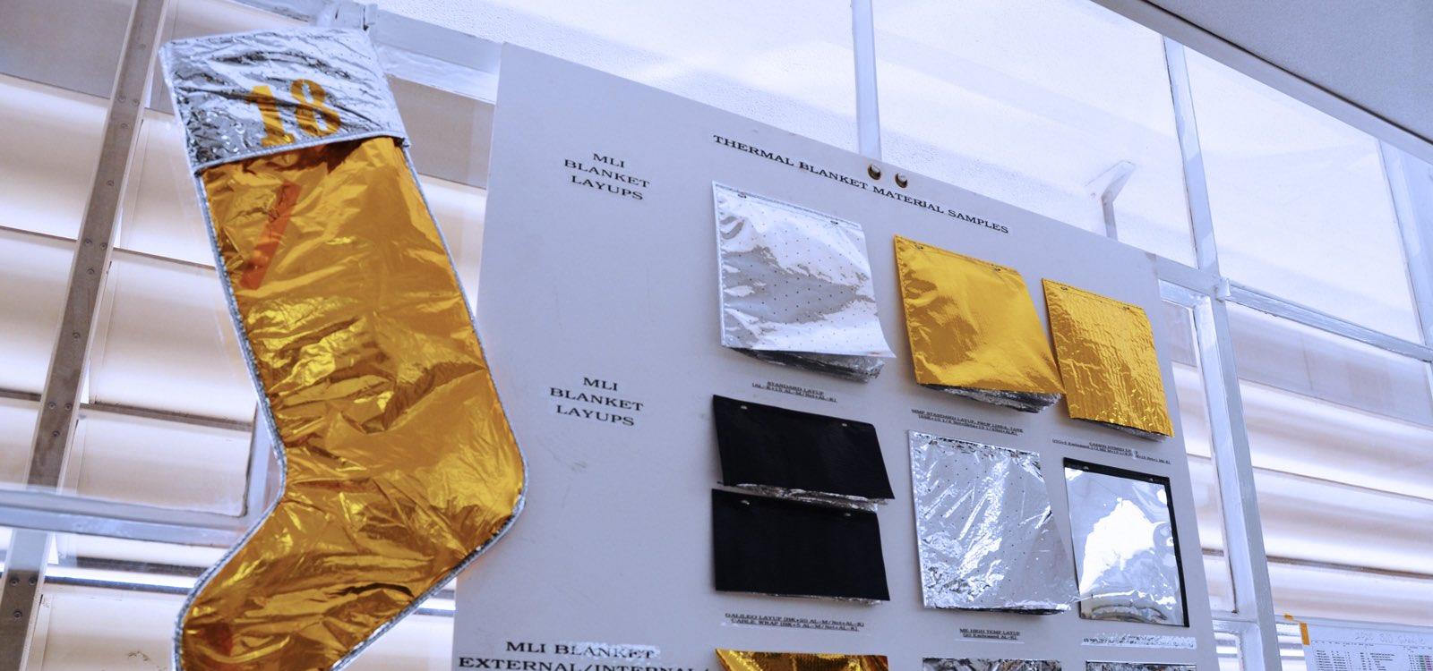 火星上发现亮闪闪的人造物体,夹在两块岩石之间,究竟是什么?