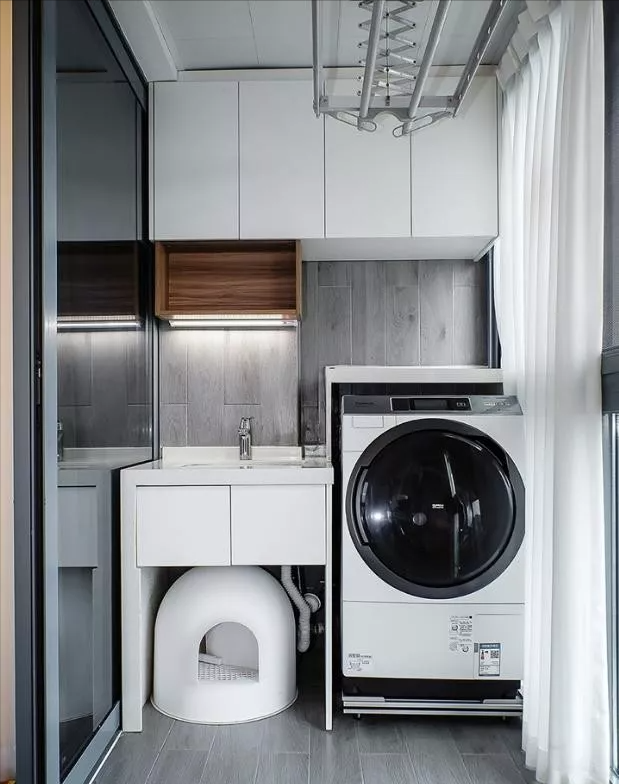 阳台别买洗衣柜,学着这样打一个,不仅实用,颜值还提高一倍