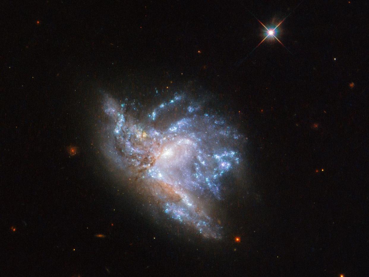 宇宙拥有大量星系,为什么星系具有不同的形状?