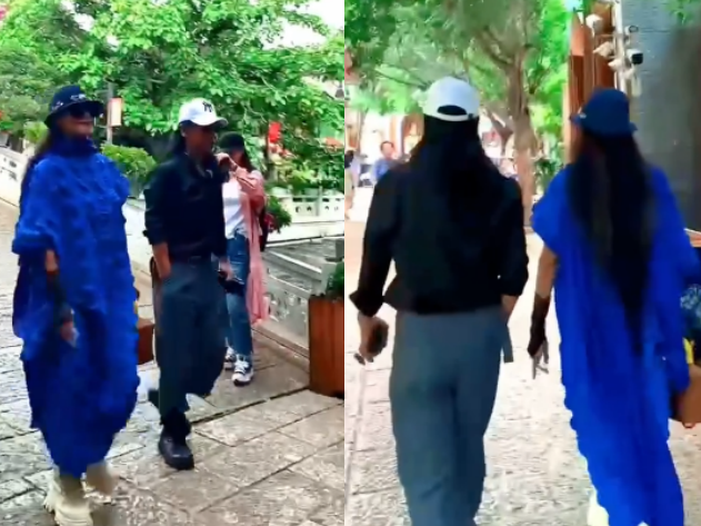 杨丽萍|63岁杨丽萍街头遭围观！脚踩厚底鞋打扮夸张，神秘异性全程陪伴