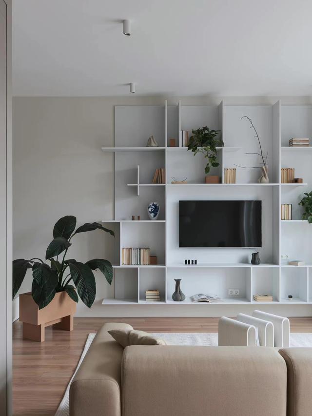 53㎡小户型的家，浅色调小屋建瓴，一整面墙定制柜惊艳众人，爱了