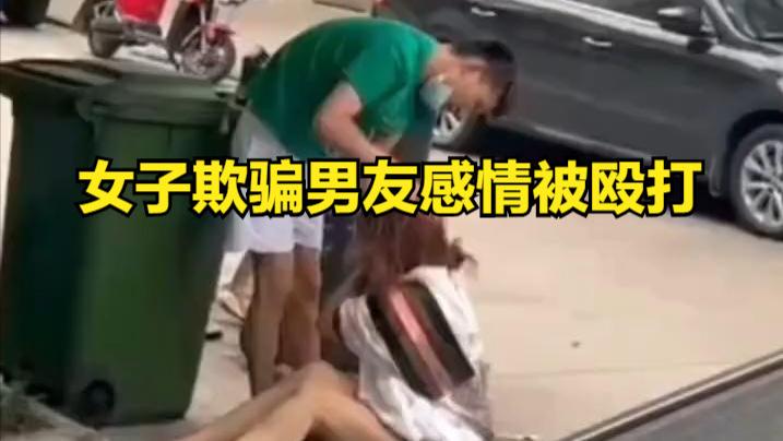 情侣街边发生冲突，男友竟将垃圾桶套在女子身上！网友：太过分了