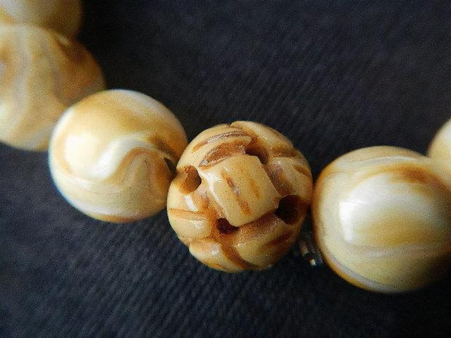 天珠|靠漂染就能混成一国之宝的文玩