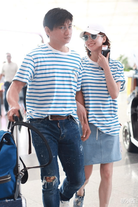 36岁刘诗诗和大17岁吴奇隆走机场,又瘦又会穿,把他熬成微胖大叔