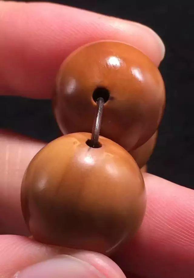 新疆维吾尔自治区|教你如何挑选橄榄核正圆光珠!