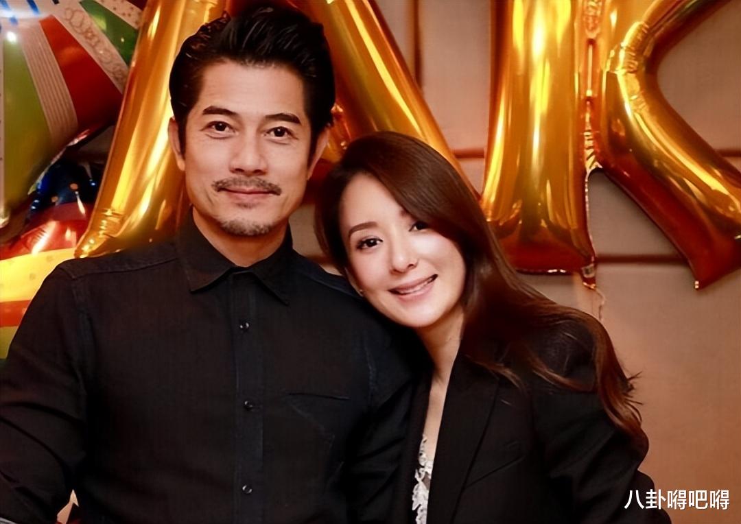 郭富城夫妇英国扫货奢侈品!方媛个不足160,裤子拖地似儿童模特