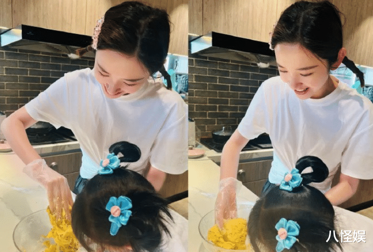 唐艺昕带女儿度假,与亲朋聚餐热聊,白纱遮面别具一格装扮超惹眼