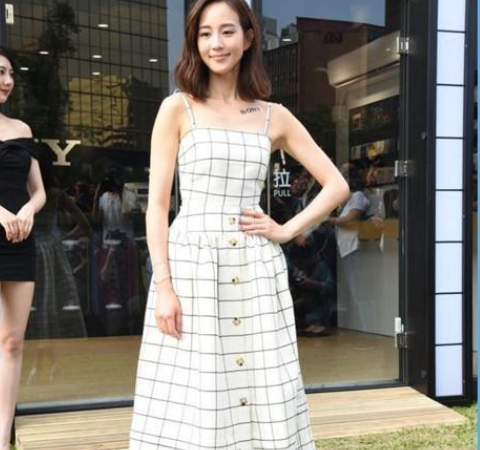 发型 张钧甯新发型被吐槽，齐刘海配靴子，美得真大胆