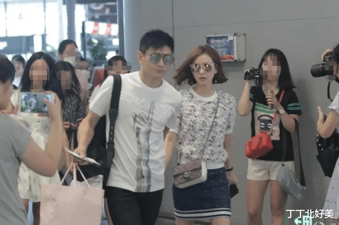 刘诗诗与大17岁的吴奇隆走机场，穿衣打扮洋气，反衬男方略显微胖