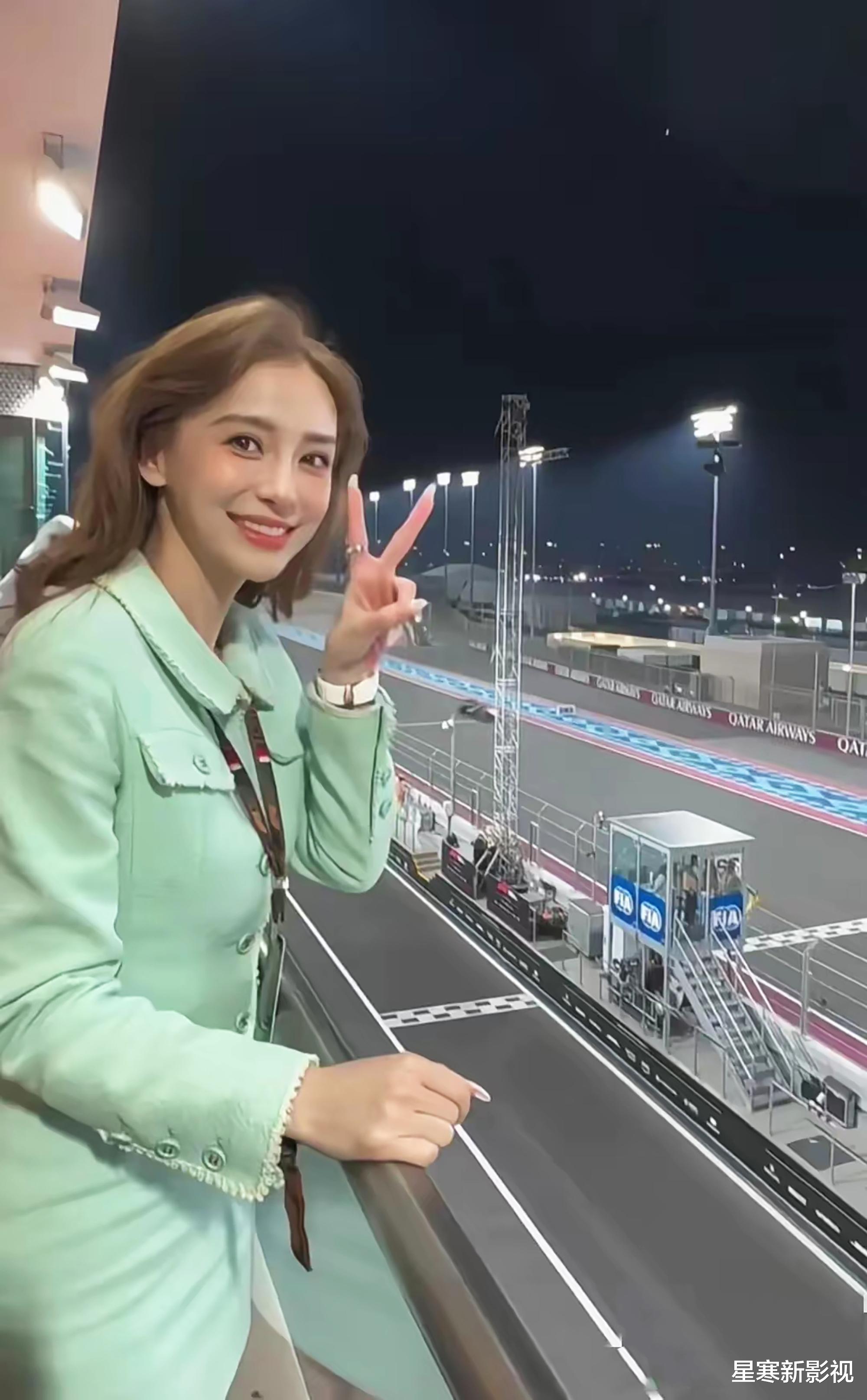 杨颖现身卡塔尔看赛车，黄发绿裙美得很显眼，一身穿搭价值不菲！