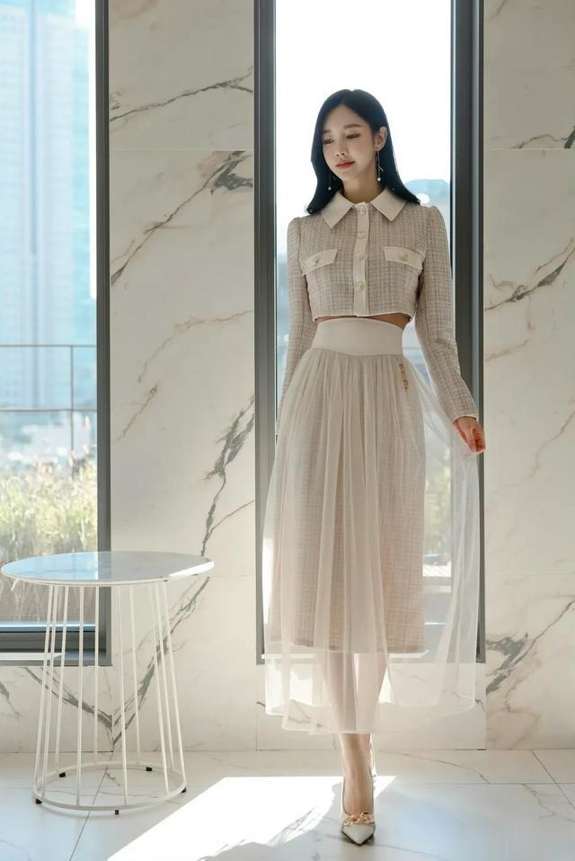 孙允珠：东方古调雪松杏黄清新花摆裙