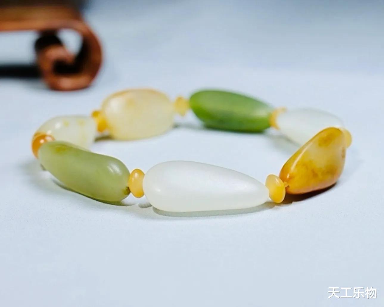 籽料玩家毕业之作!天然无修的和田原籽手串该怎么配?