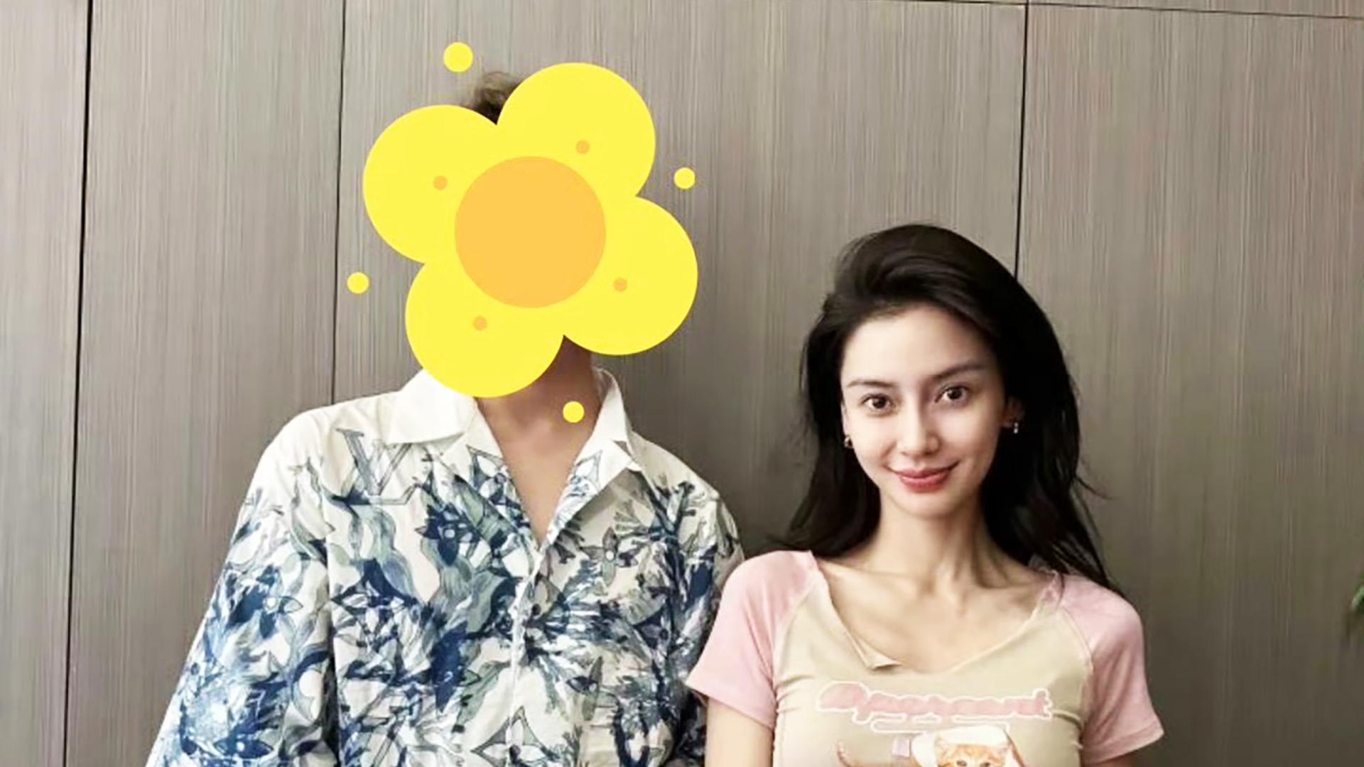 杨颖近照曝光，辣妹风穿搭状态好松弛，与路人合影毫无明星架子