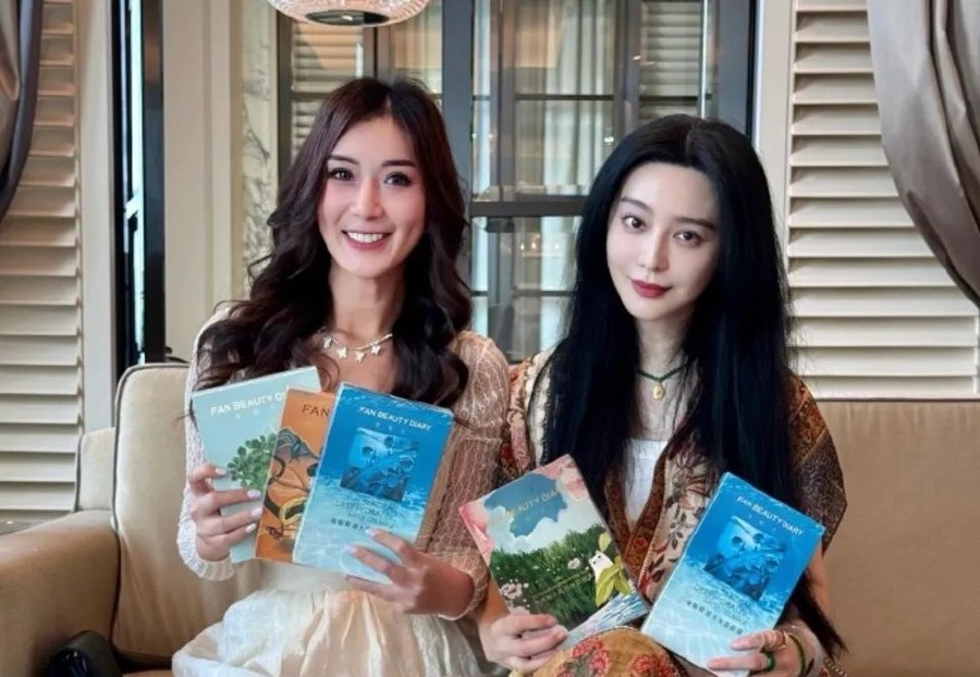 43岁范冰冰跻身马来西亚上流社会,与顶级富豪聚餐,拍照站C位!