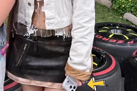 徐子淇和老公李家诚去看新加坡F1，她穿超短裙很年轻，眼皮有些肿