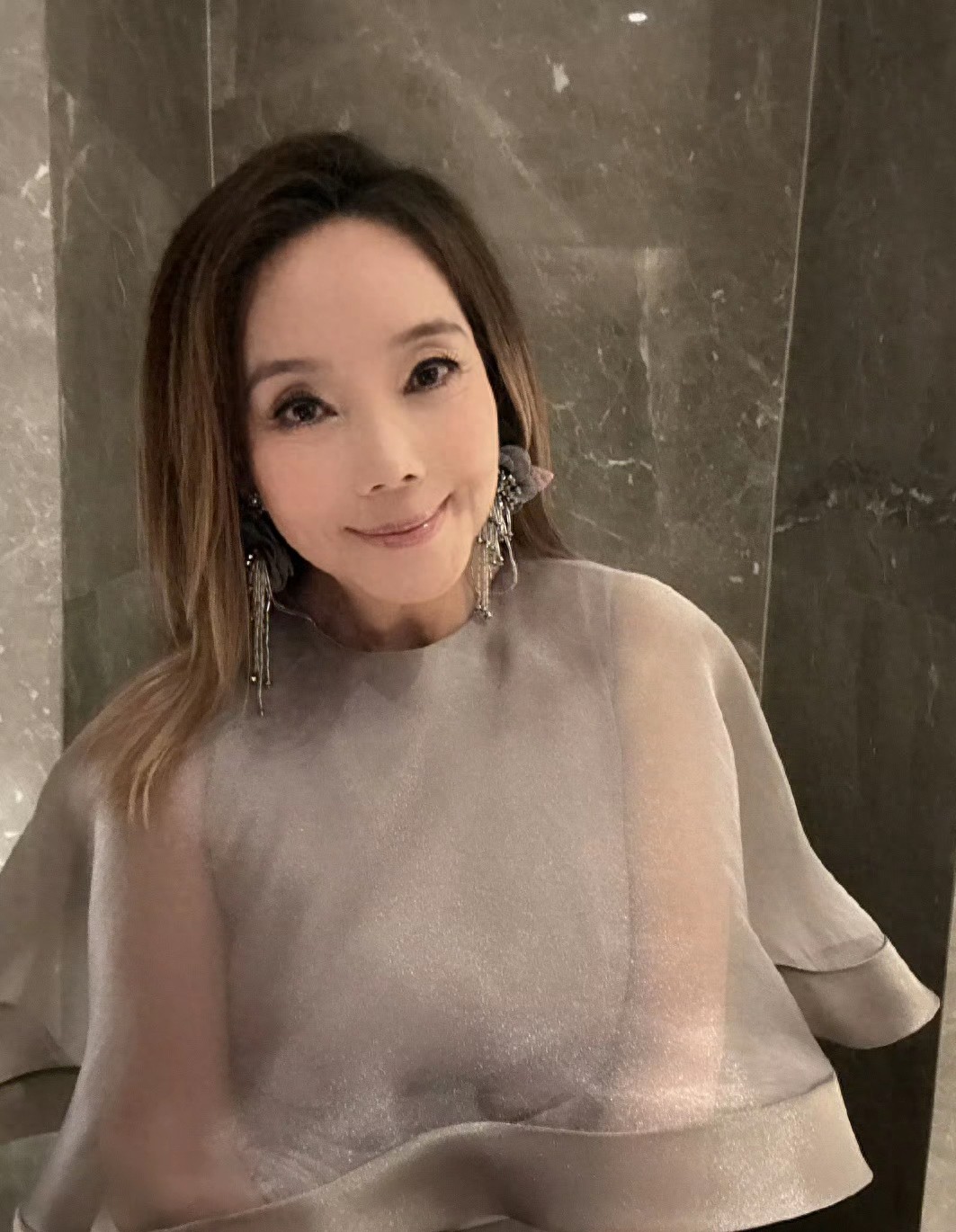 辛晓琪：与初恋丈夫分开后，又爱上小20岁男友了